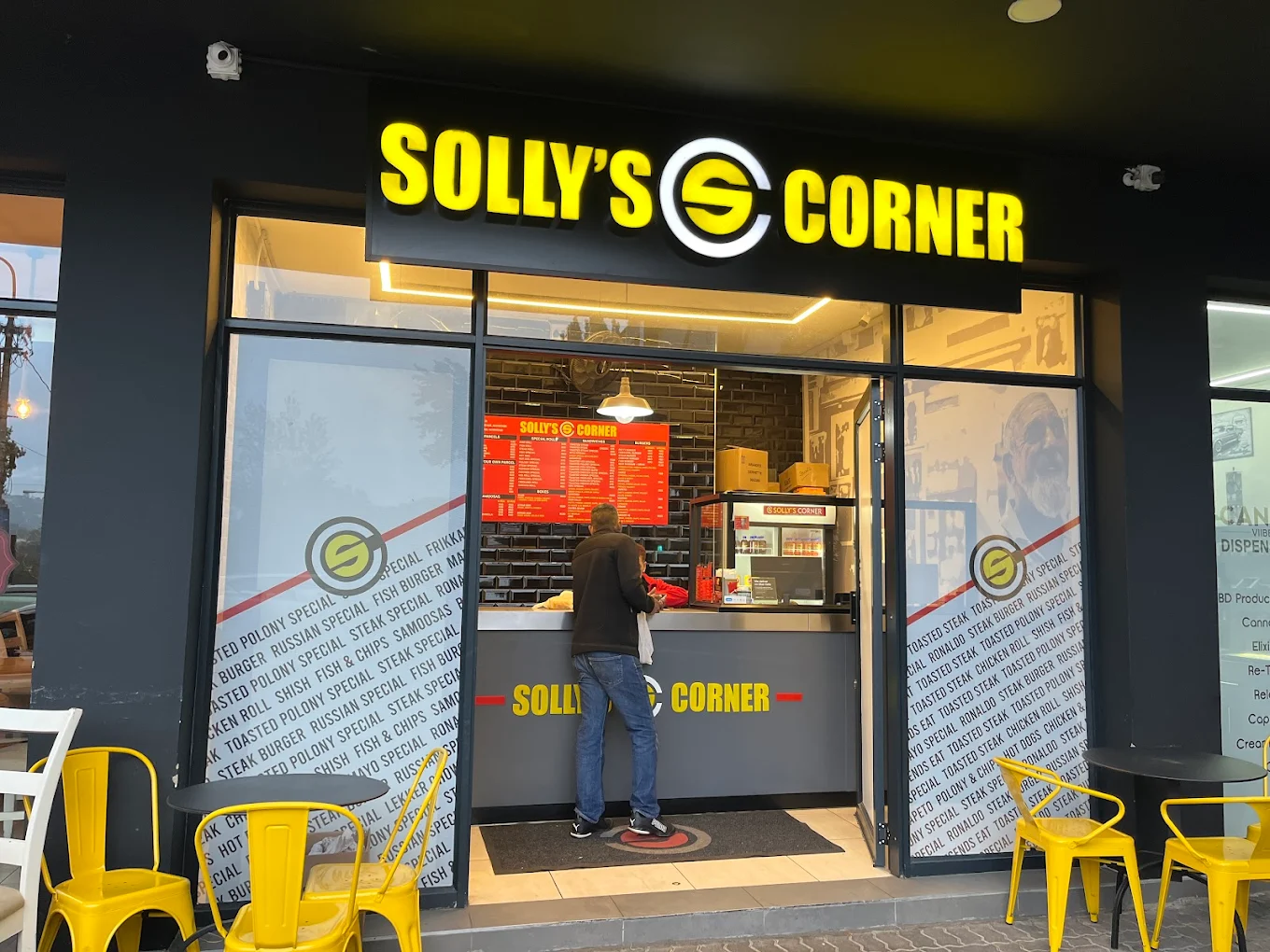 Solly's Corner Norwood shopfront on Iris Road with signature yellow signage